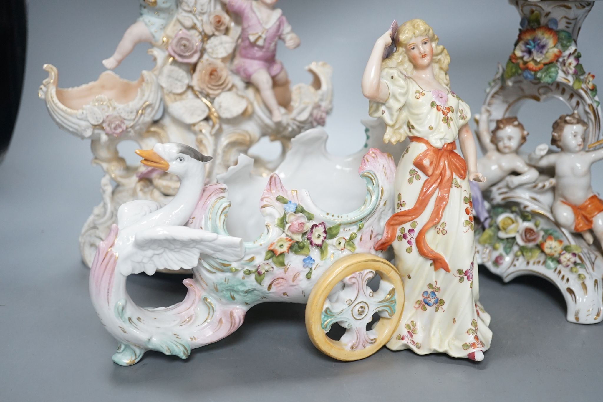 A French bisque centrepiece, Naples porcelain centrepiece and figural chariot, tallest 44cm